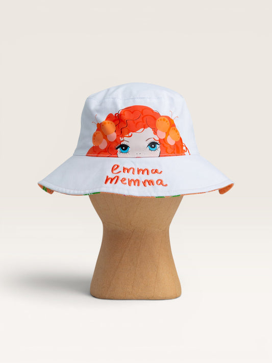 Child wearing Emma Memma reversible bucket hat Emma Memma side