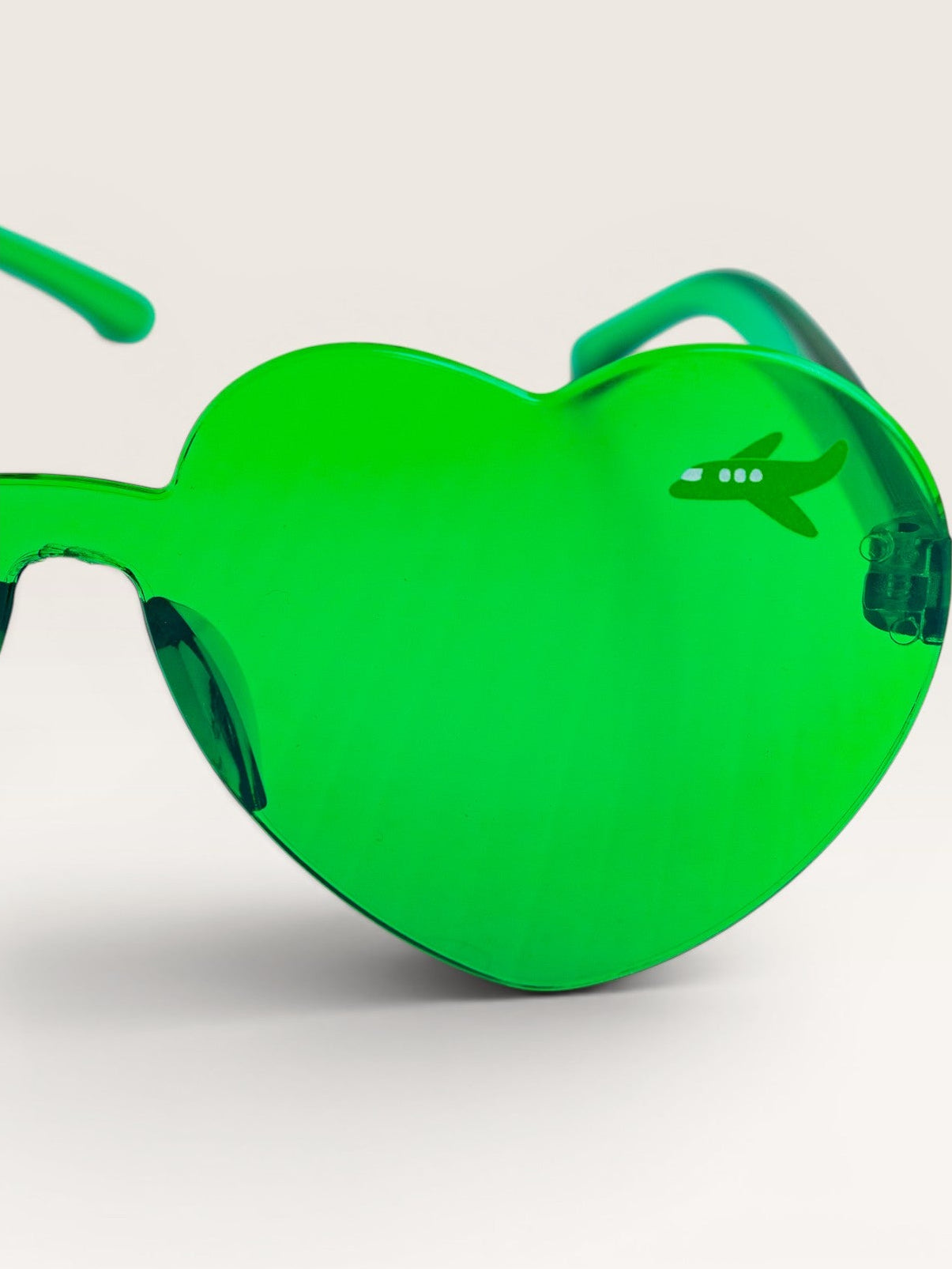 Emma Memma green love heart sunglasses close-up showing heart shape
