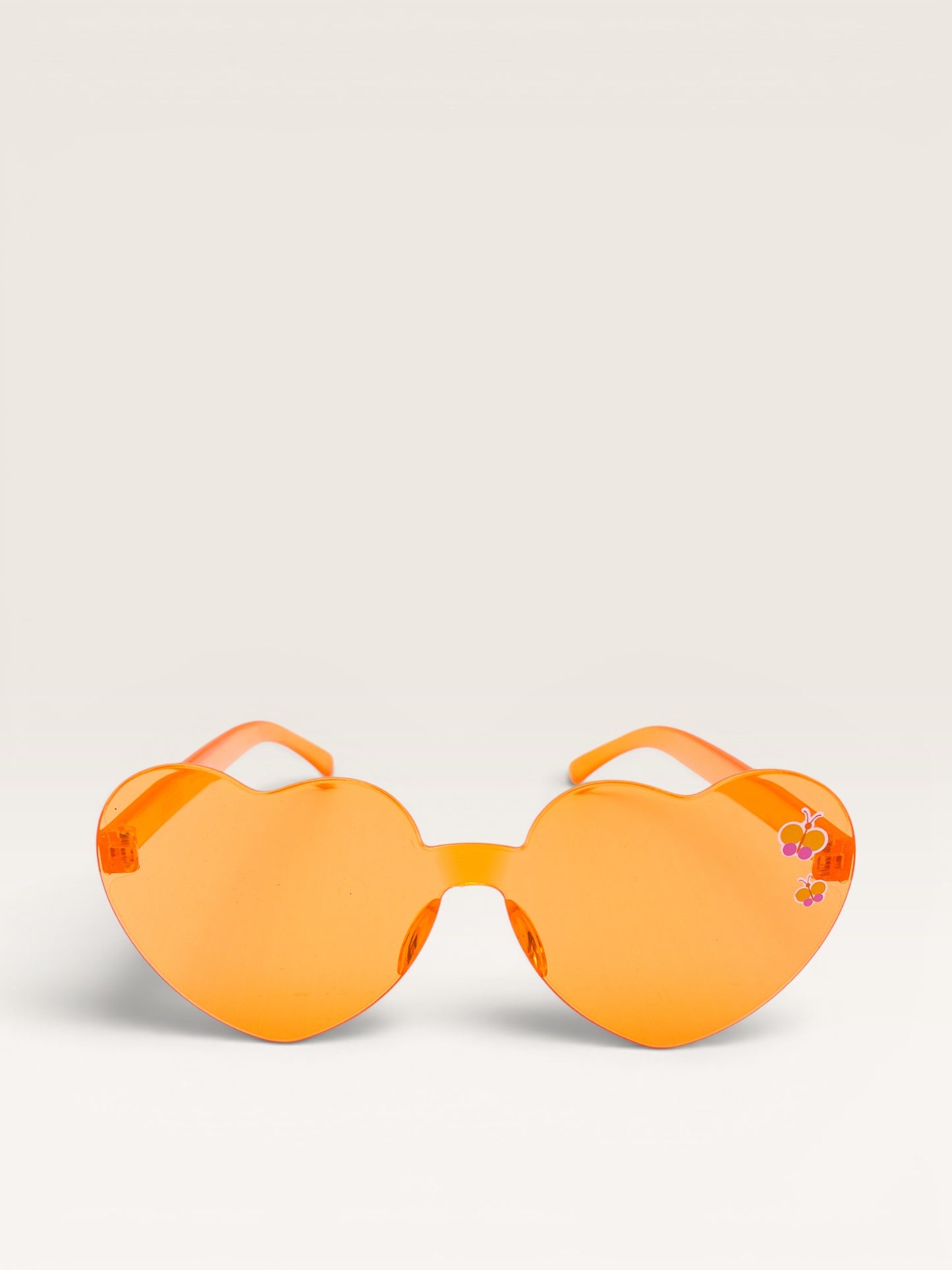 Emma Memma orange love heart sunglasses close-up