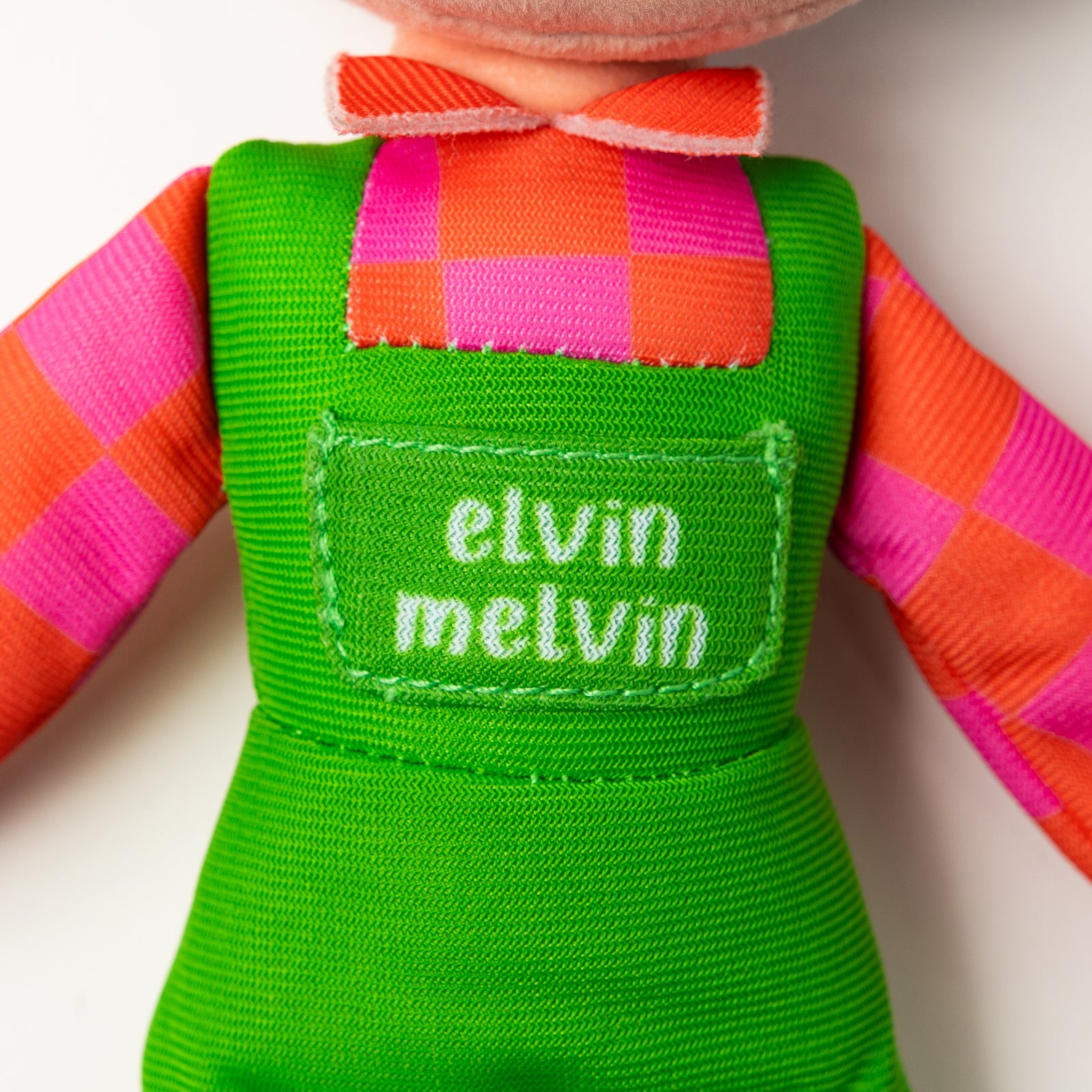 Elvin Melvin plush toy displayed with Emma Memma merchandise