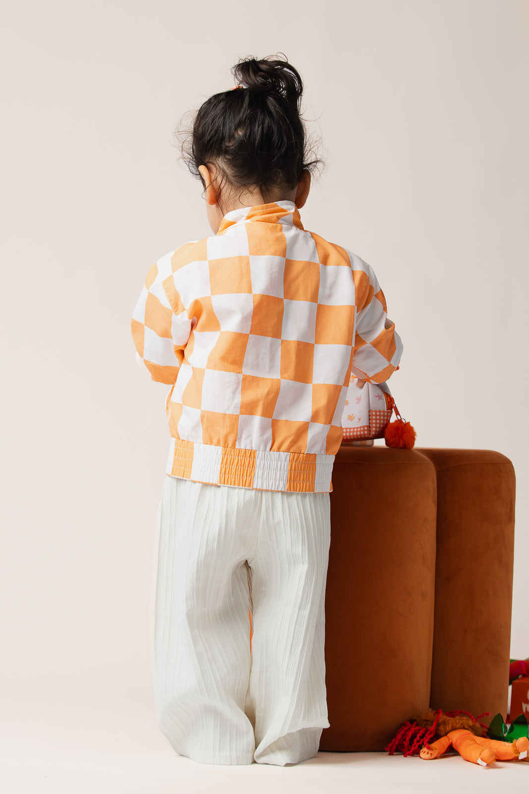 Emma Memma bomber jacket back view showing check print