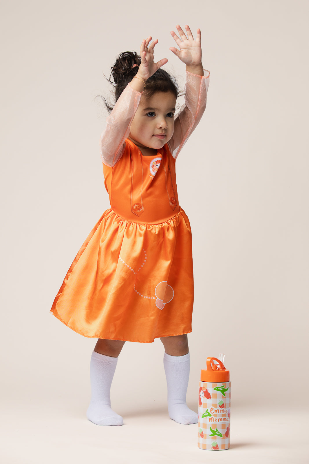 Child twirling in Emma Memma Costume Dress