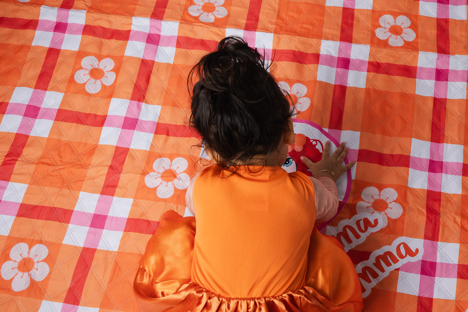 Emma Memma Picnic Rug shown from above at a picnic