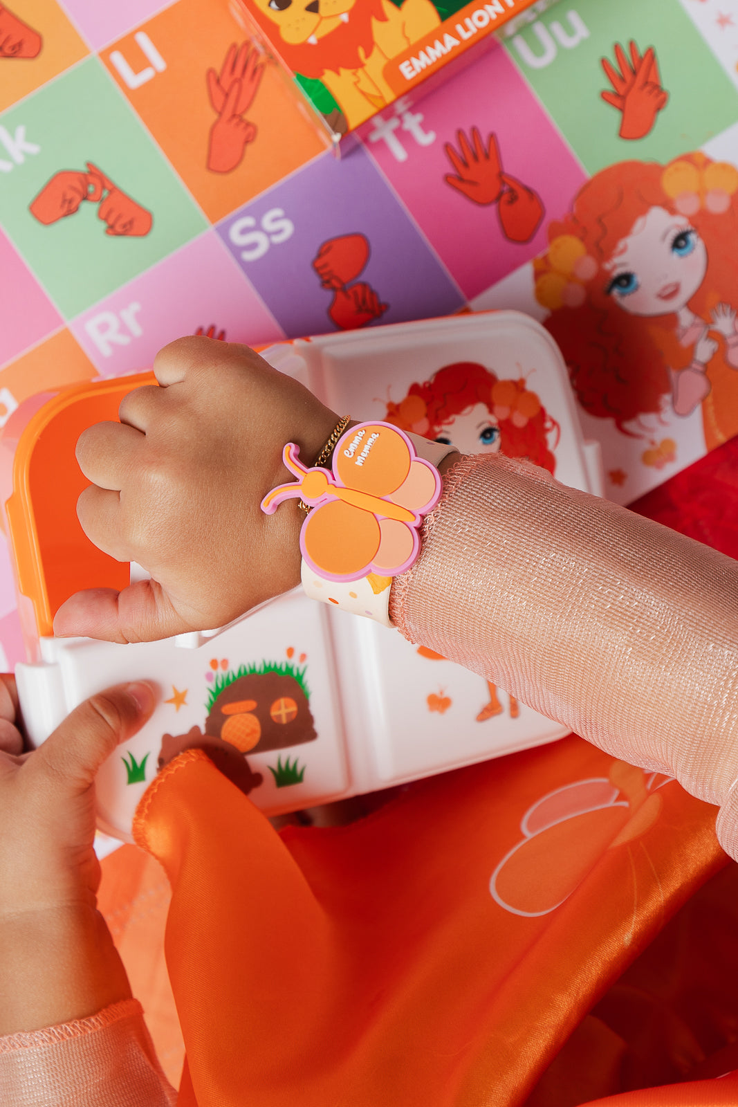 Child wearing Emma Memma Butterfly Slapband on wrist