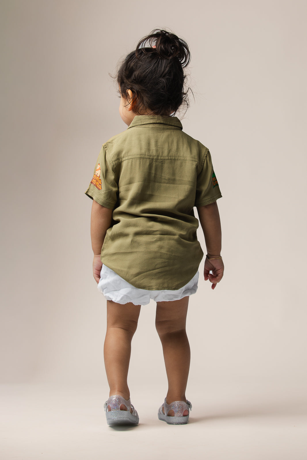 Emma Memma Jungle Picnic shirt front view showing animal print