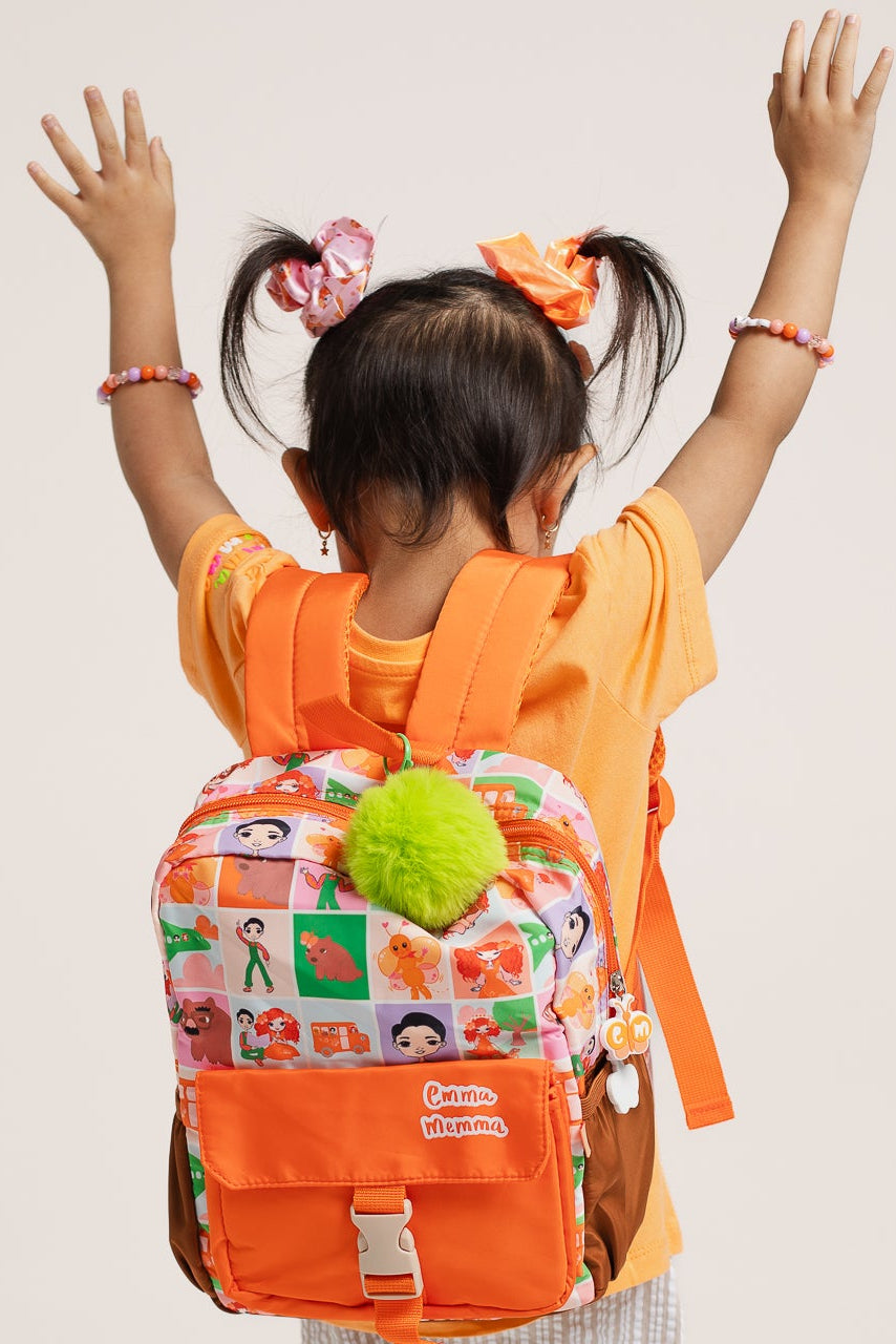 Child wearing Emma Memma Accessory Set with sunglasses and clips