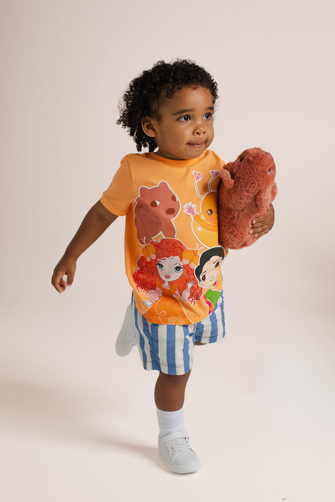 Child wearing Emma Memma characters t-shirt front view