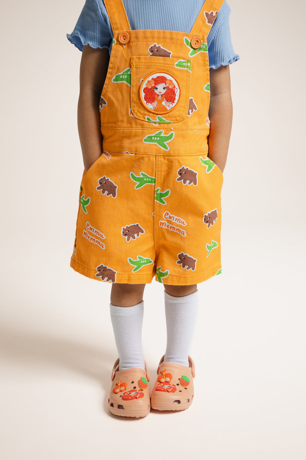 Emma Memma overalls front view showing wombat and plane print