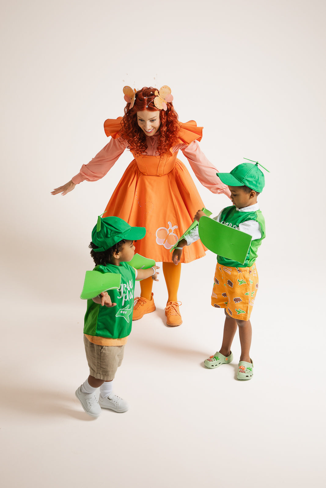 Child wearing Emma Memma Green Plane costume side view