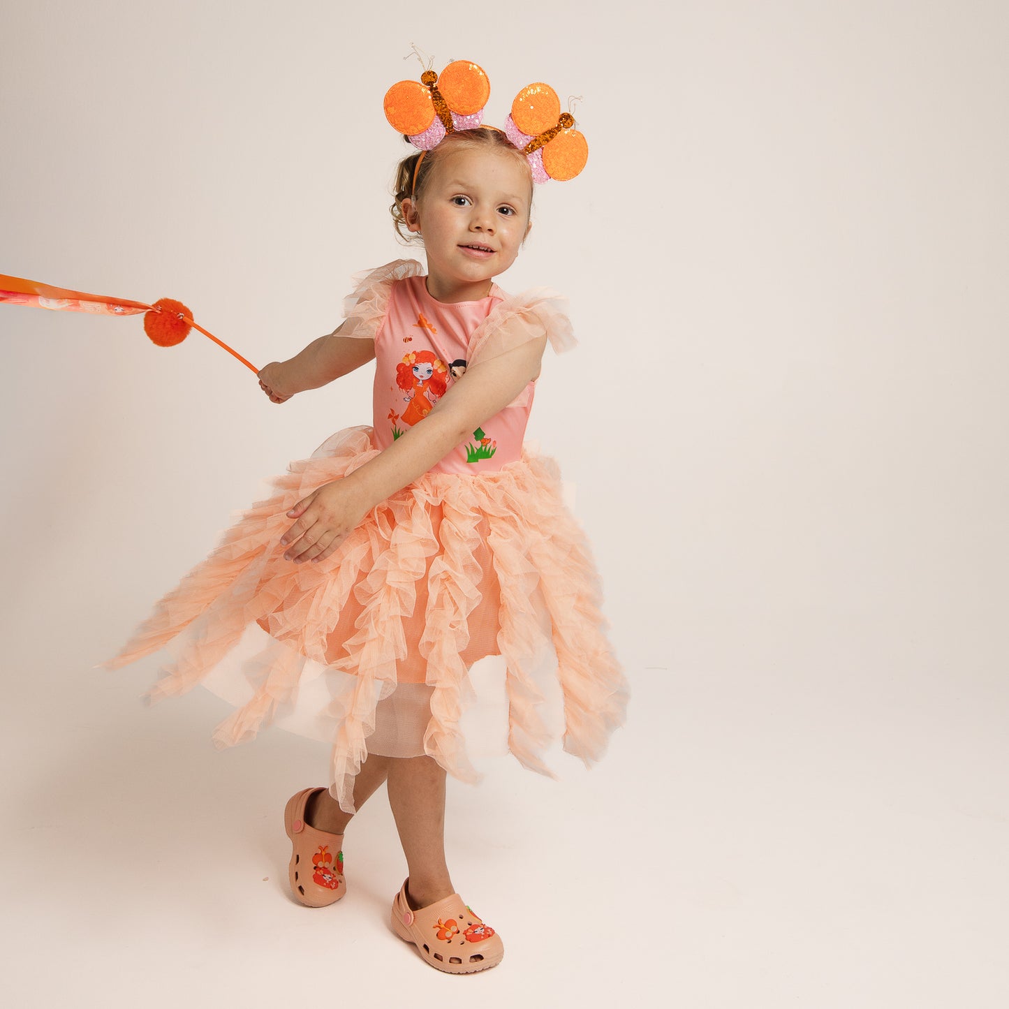 Child wearing Emma Memma Butterfly Headband front view