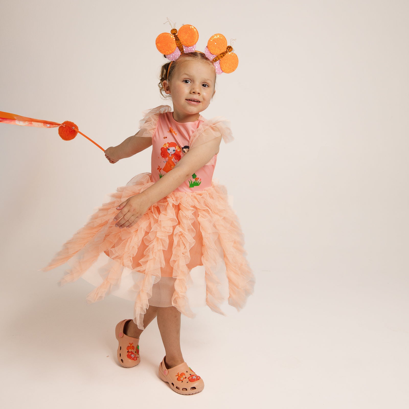 Child wearing Emma Memma Butterfly Headband front view