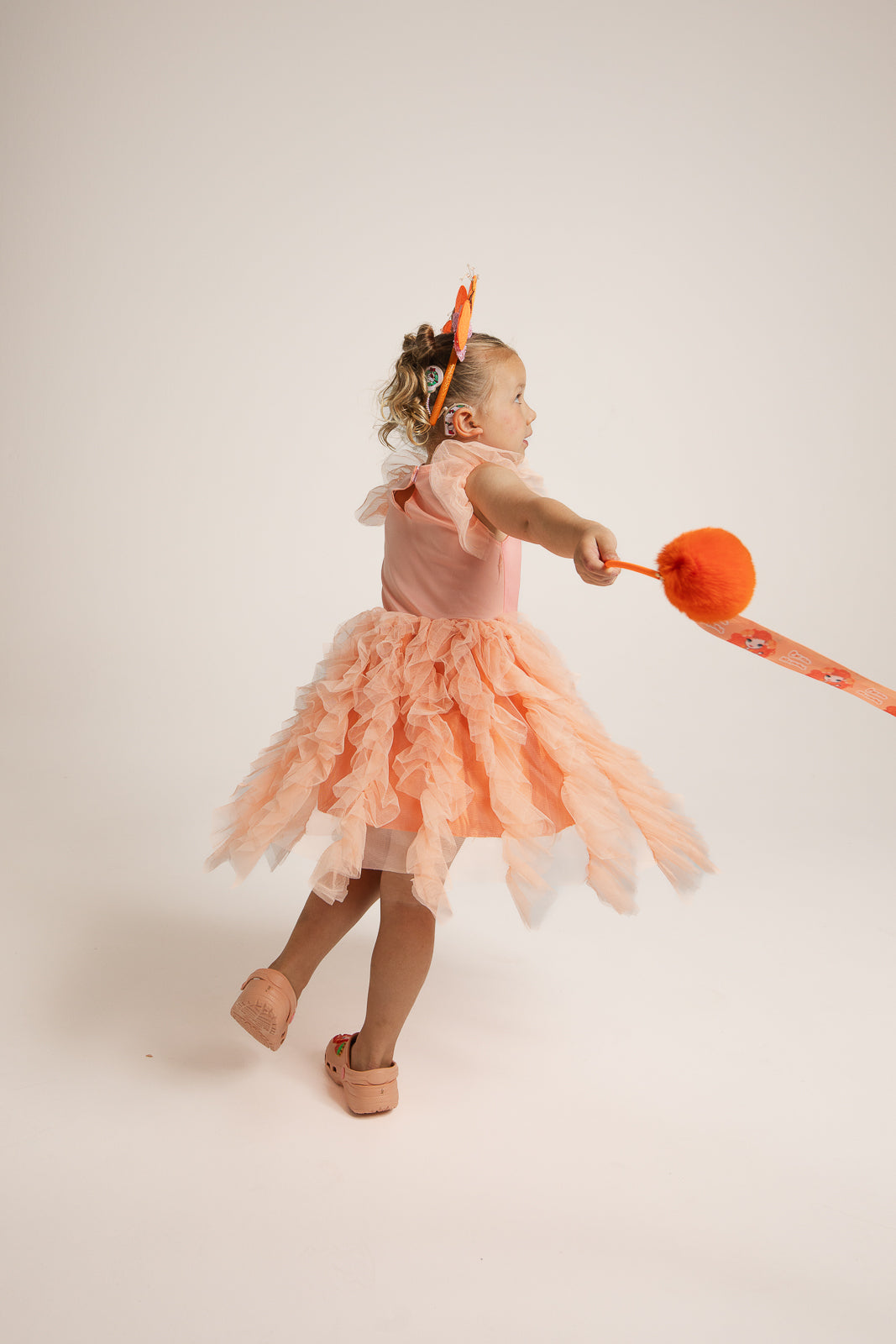 Child twirling in Emma Memma Deluxe Tulle Dress