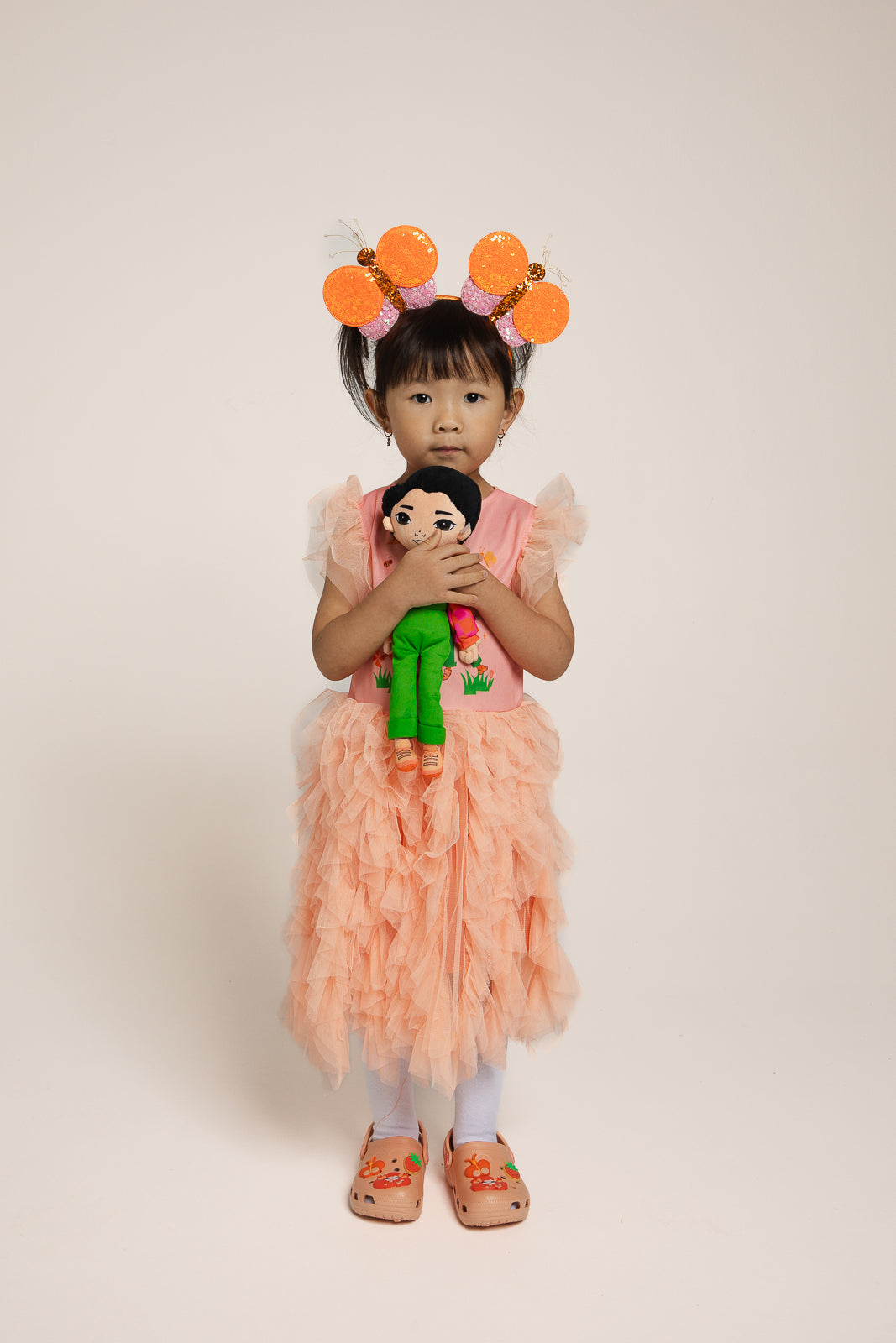 Elvin Melvin plush toy close-up showing face and costume